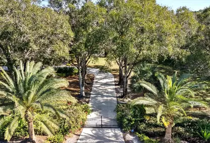 An entrance to a luxury home in Boca Grande, Boca Raton
