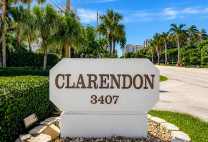 Clarendon Condo Highland Beach entrance sign with palm trees, coastal landscaping, and luxury South Florida condominium lifestyle.