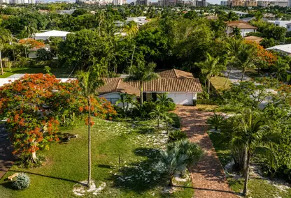 Cushman Alain Boca Raton luxury real estate aerial with waterfront estates, canals, and South Florida coastal living.