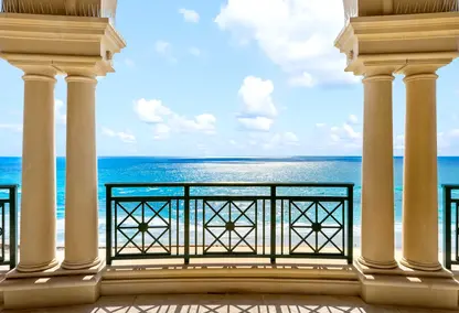 Luxuria condos Boca Raton beach view with Atlantic Ocean, sandy shoreline, coastal dunes, and luxury real estate lifestyle.