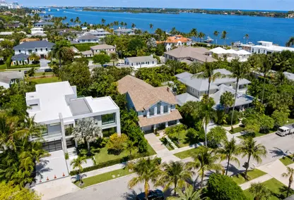 Aerial view of Toledo Neighborhood in West Palm Beach with waterfront estates, palm-lined streets, and luxury real estate lifestyle.