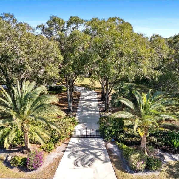 An entrance to a luxury home in Boca Grande, Boca Raton