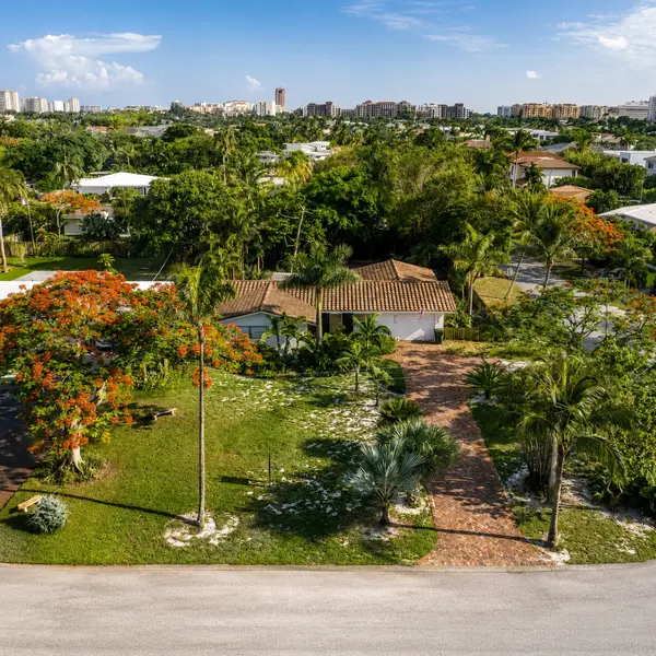 Cushman Alain Boca Raton luxury real estate aerial with waterfront estates, canals, and South Florida coastal living.