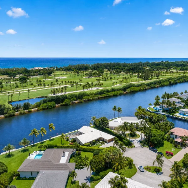 Gulf Stream Town luxury real estate aerial in South Florida with waterfront homes, Intracoastal views, golf course, and coastal estates.