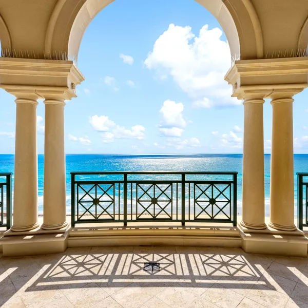 Luxuria condos Boca Raton beach view with Atlantic Ocean, sandy shoreline, coastal dunes, and luxury real estate lifestyle.