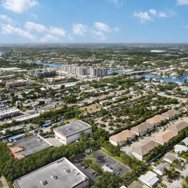 Juno Ridge South Florida luxury real estate aerial with residential neighborhoods, Intracoastal access, and coastal city views.