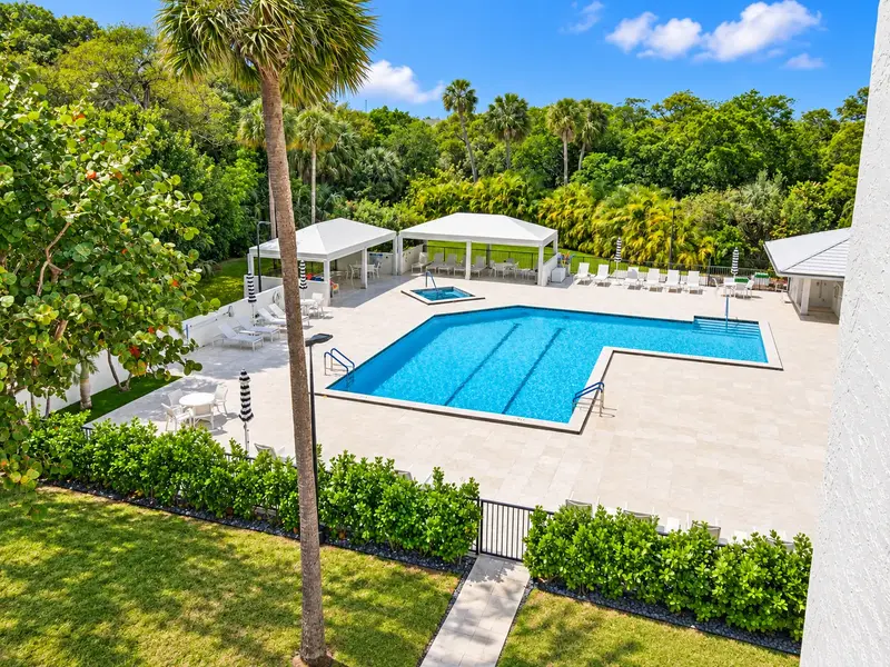 La Fontana Boca Raton resort-style pool with tropical landscaping, cabanas, and luxury condominium amenities.