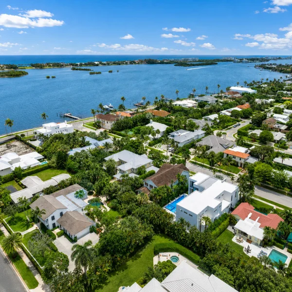 Toledo Neighborhood West Palm Beach aerial with coastal homes, lush greenery, nearby water views, and upscale South Florida living.