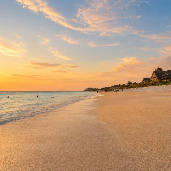 South Beach Park in Vero Beach, FL at sunset with oceanfront homes, sandy shoreline, and Treasure Coast real estate scenery.