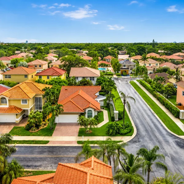 Victoria Lakes neighborhood in Pembroke Pines with Mediterranean-style homes, tile roofs, and South Florida real estate appeal.