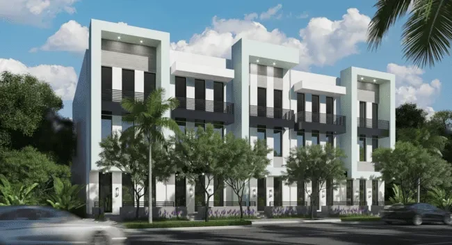 Front view of Delray Town Villas showing modern townhomes with clean lines, tall windows, and simple landscaping.