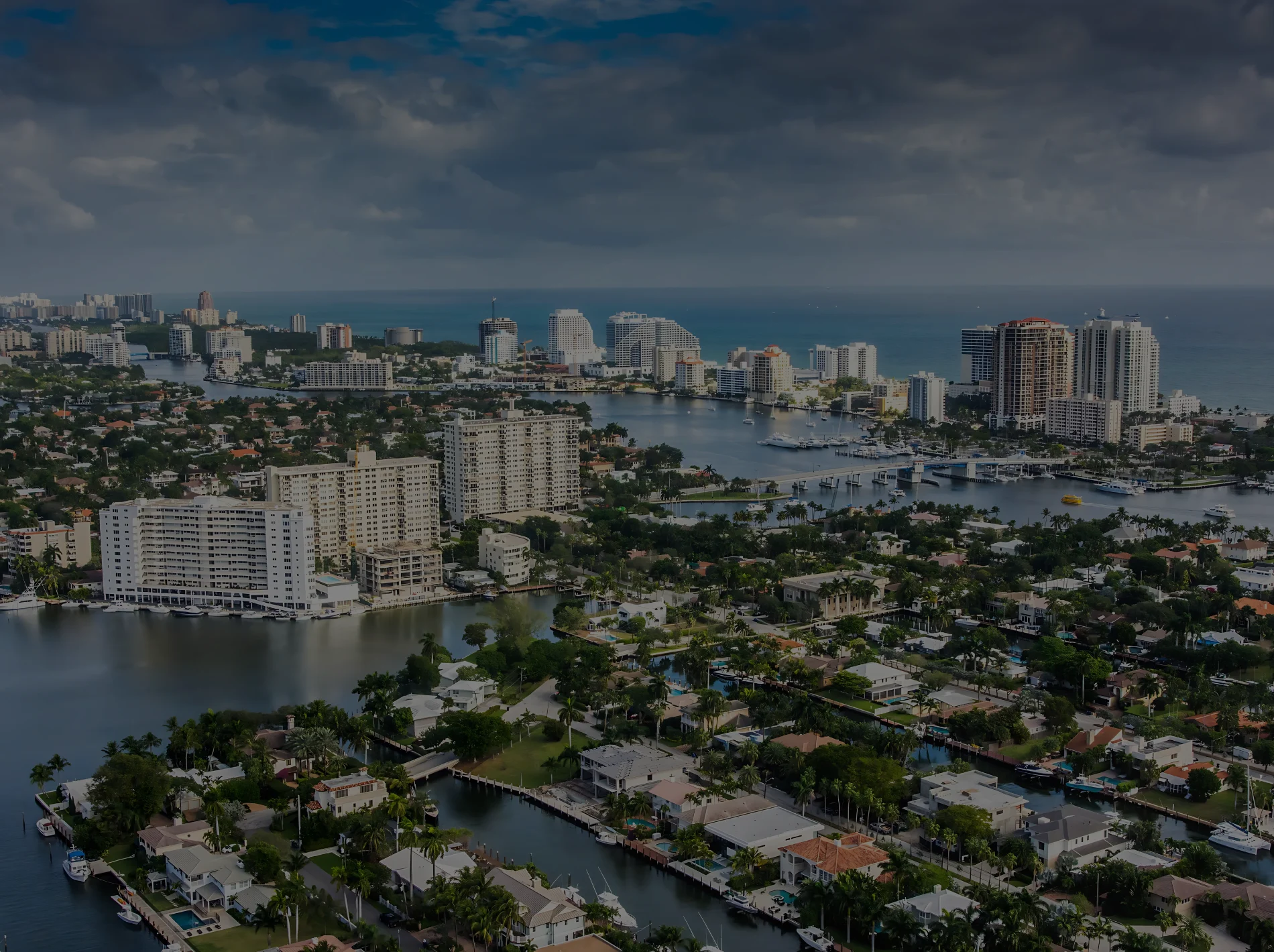 Aerial view of waterfront homes and high-rises in Broward County, Florida