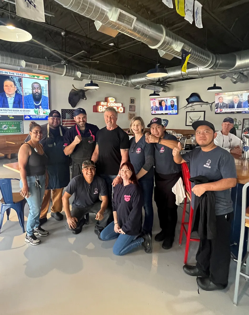 Sylvester Stallone with Pig Beach BBQ's executive chef Matt Abdoo and team at the West Palm Beach location.