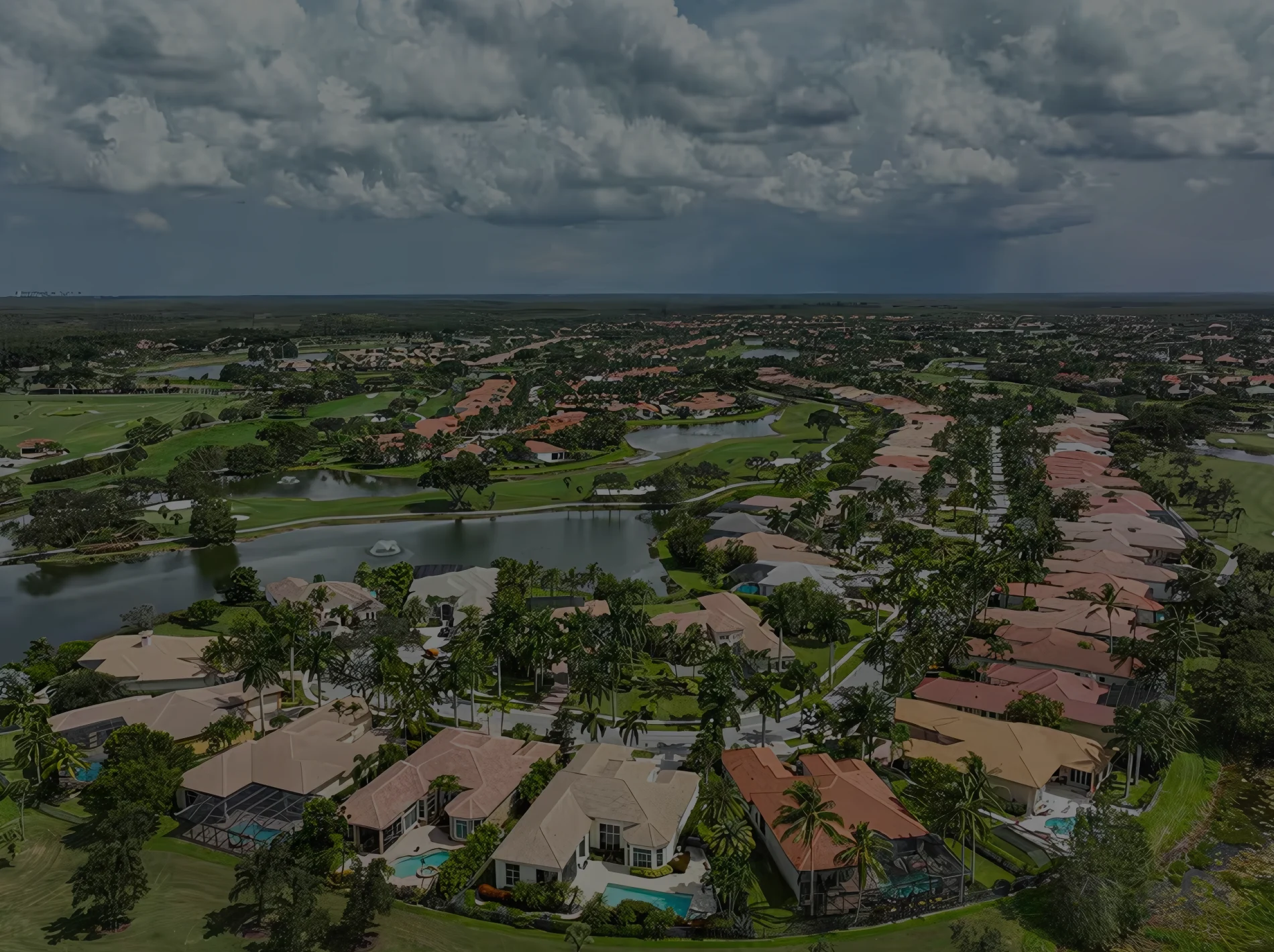 An image of luxury homes in The Acreage, Florida on a sunny day