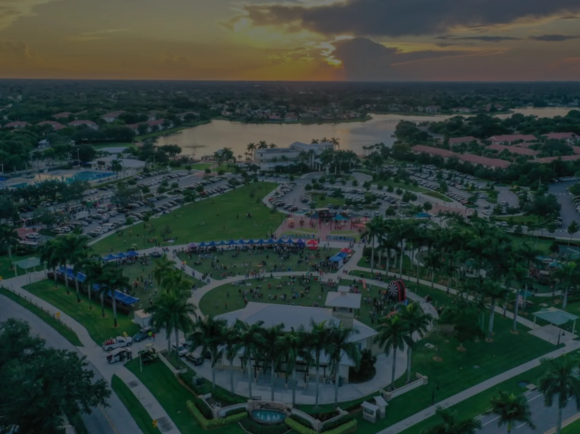 An image of Wellington, Florida at dusk along the water.