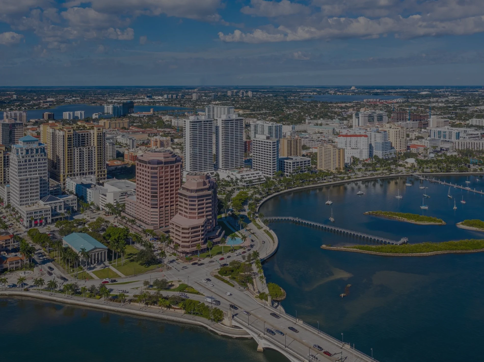 An image of West Palm Beach at dusk along the water.