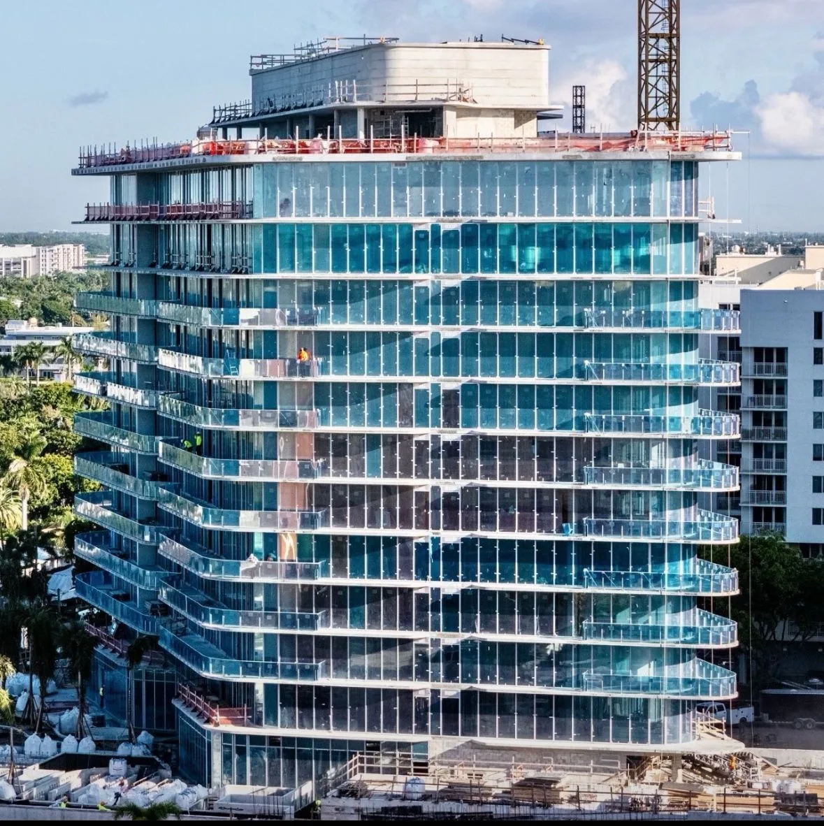 Side elevation of the Ritz-Carlton Residences Pompano Beach showing progress on exterior glass and balconies.