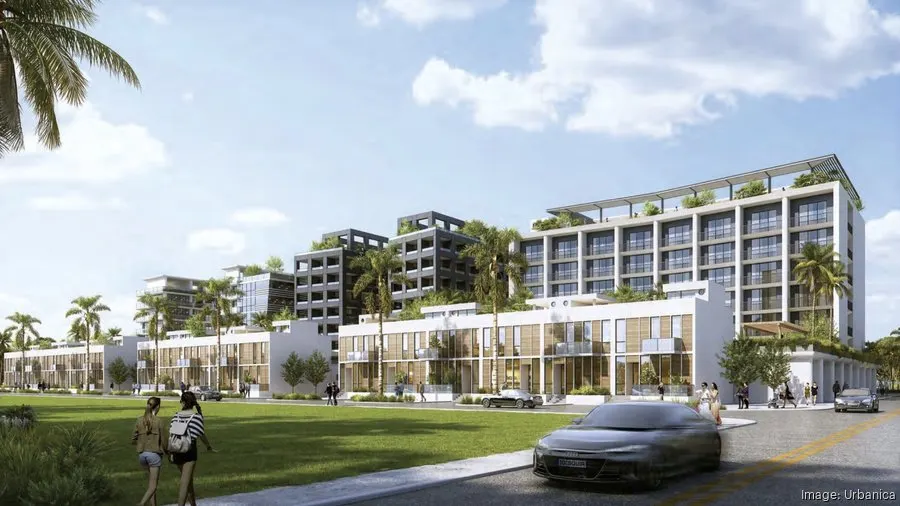 Street-level view of Dania Beach mixed-use project showing residential townhouses in front of condo-hotel and hotel towers with rooftop greenery.