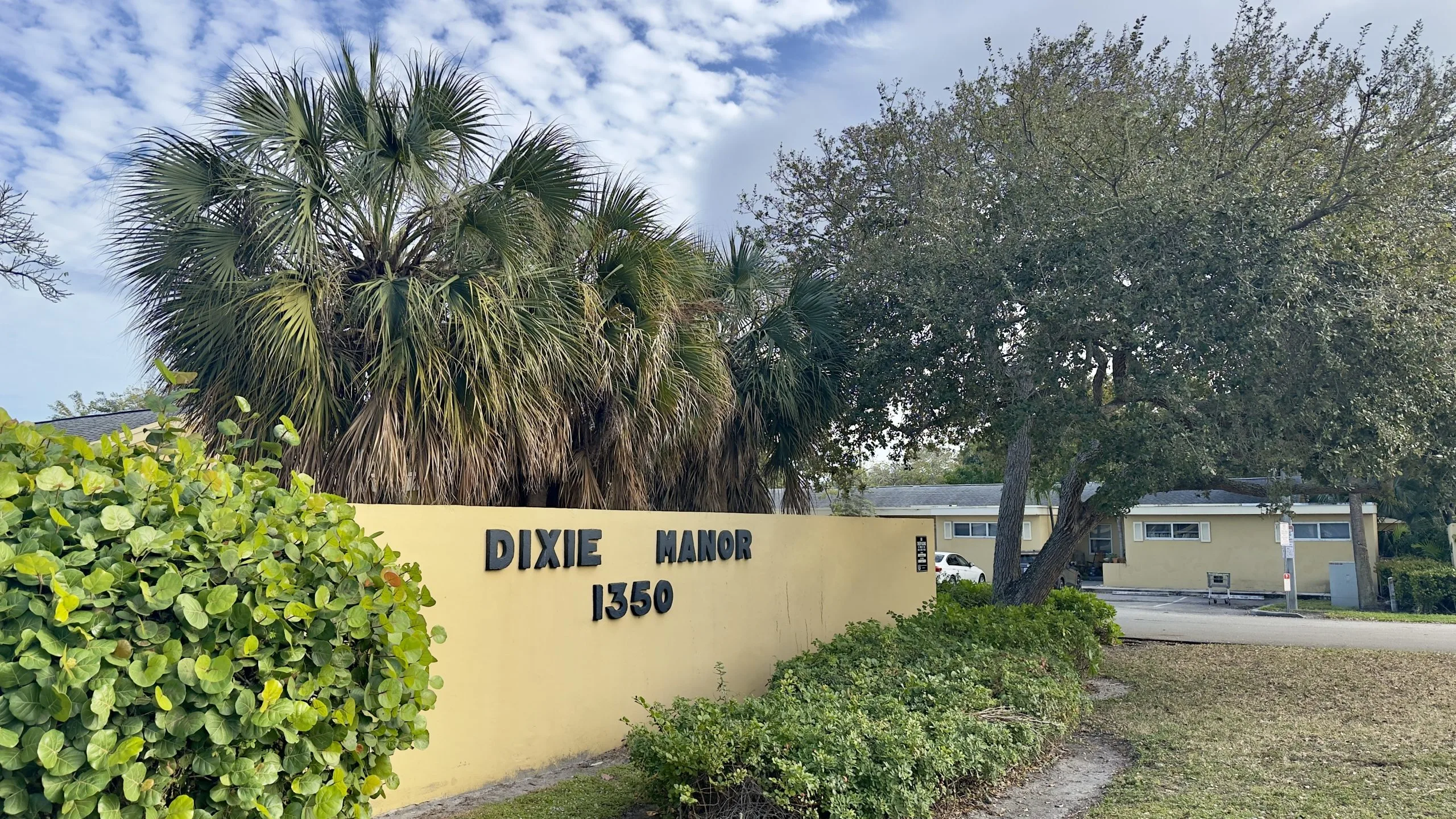 Entrance sign for Dixie Manor apartments in Boca Raton’s Pearl City neighborhood, the site being redeveloped into the $52M affordable housing project, Residences at Martin Manor.