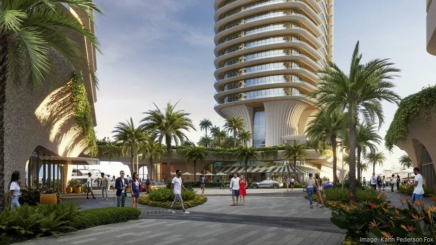 Street-level view of the Rybovich Marina redevelopment showing modern condo towers, landscaped terraces, and waterfront access in West Palm Beach.