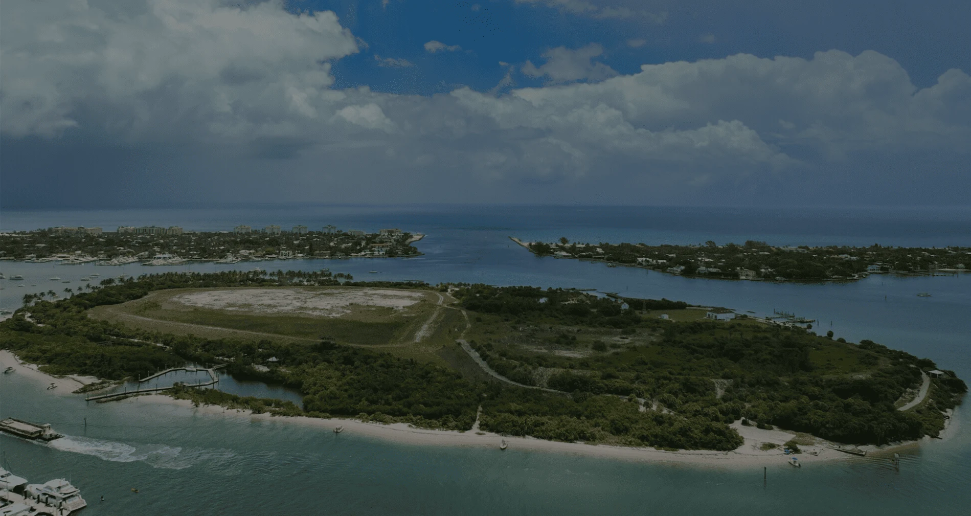 Aerial view of Peanut Island during the day time surrounded by the Atlantic Ocean.